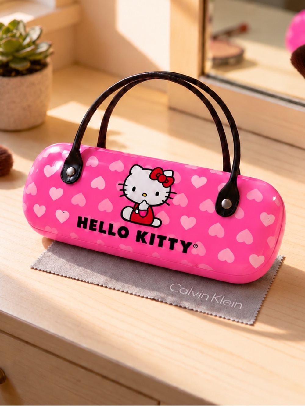 Hello Kitty pink hard eyeglasses case hearts  black handles Calvin Klein cloth